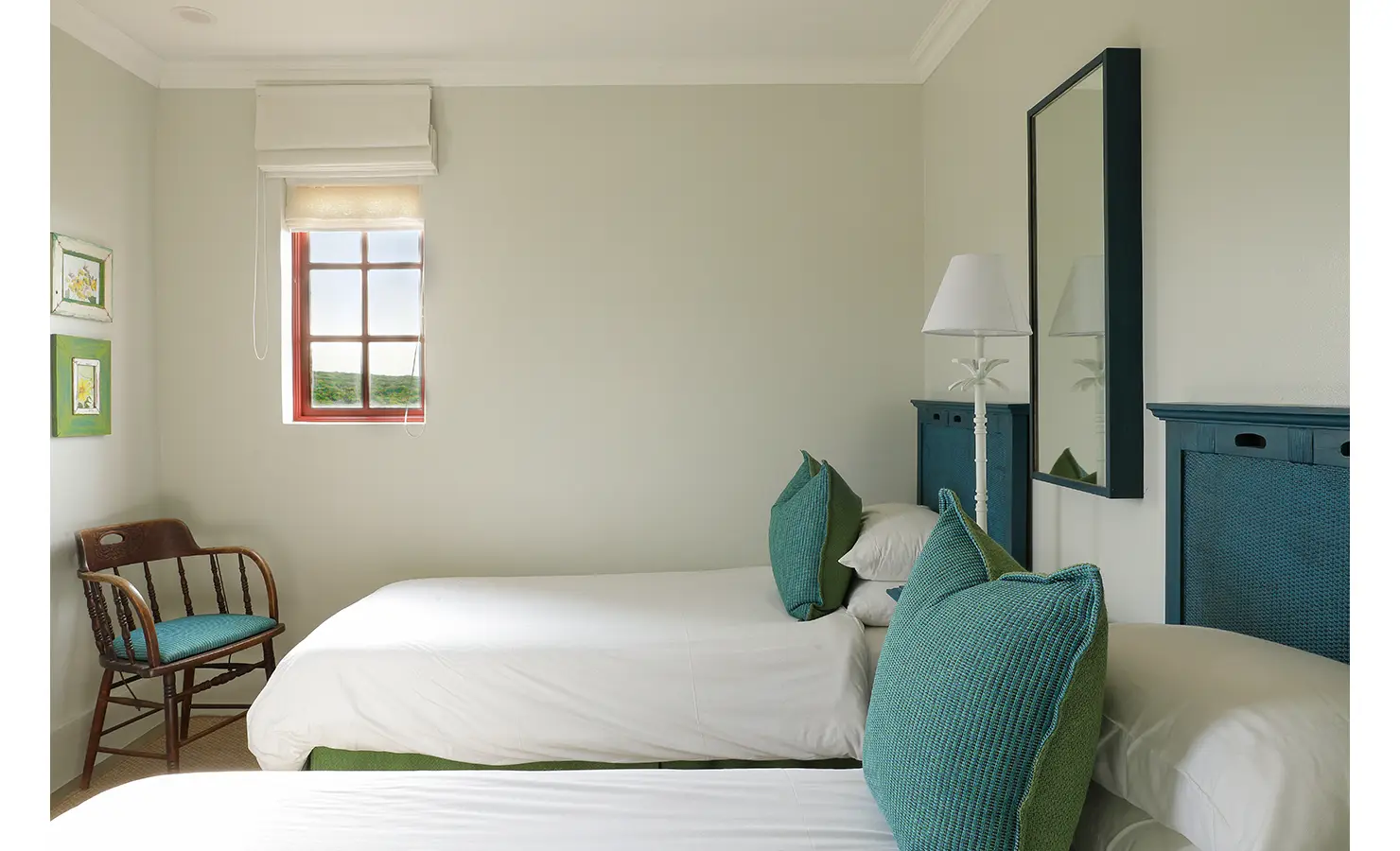 Perfect Hideaways: A tranquil twin bedroom with crisp white linens, teal cushions, woven blue headboards and matching details, set beneath a large mirror and soft lighting, Churchhaven, Fynbos.