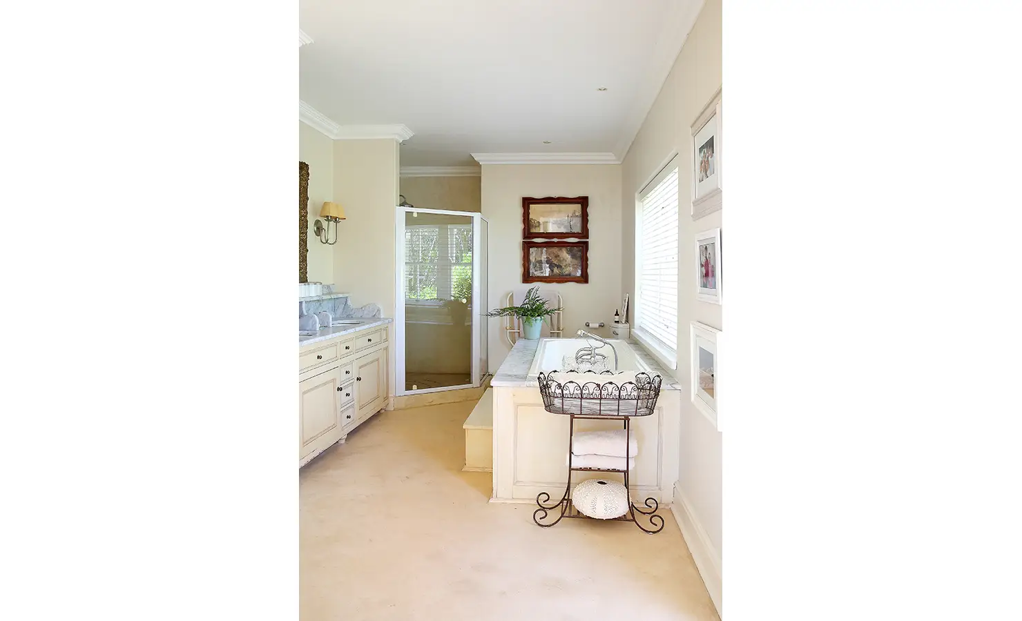 Perfect Hideaways: A luxurious bathroom featuring a marble-topped bathtub, elegant fixtures, and a serene, airy atmosphere. Beachwood On Robberg, Plettenberg Bay.