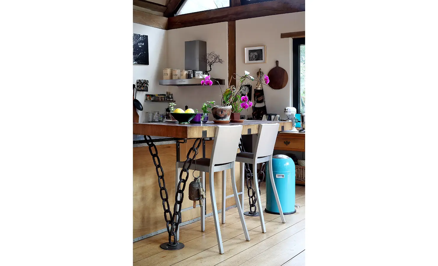 Perfect Hideaways. A modern kitchen with a stylish table and chairs, designed for comfort and functionality in dining. Gaia, Constantia.