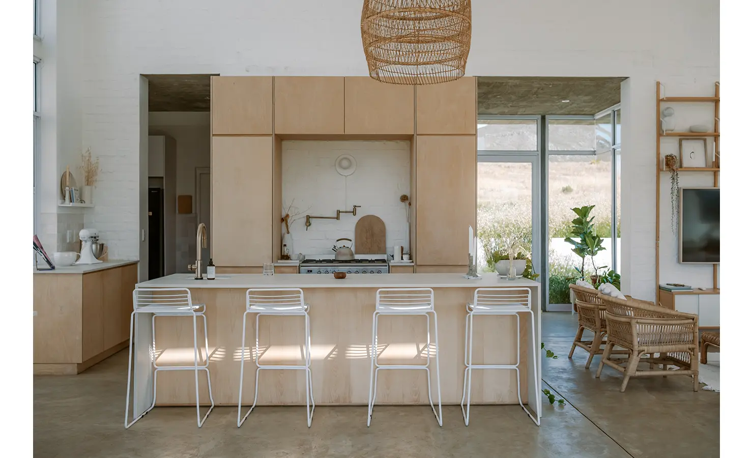 Perfect Hideaways: Modern kitchen with light wood cabinetry, central breakfast island, and seamless flow into the relaxed lounge area, Thuúla Haven, Hemel-en-Aarde.