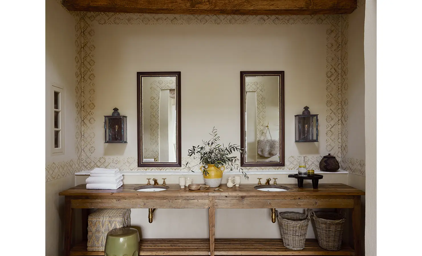 Perfect Hideaways: A rustic vanity setup with twin basins, framed mirrors, and a wooden countertop adorned with natural decor elements. Sterrekopje, Franschhoek.