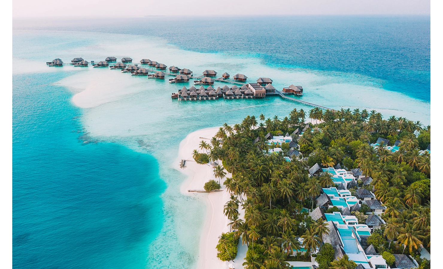 Perfect Hideaways, Conrad Maldives, Aerial view of luxury accommodation