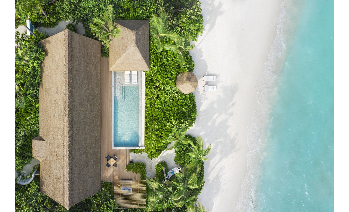 Perfect Hideaways, Waldorf Maldives, Luxury accommodation aerial view of house wth swimming pool on the beach