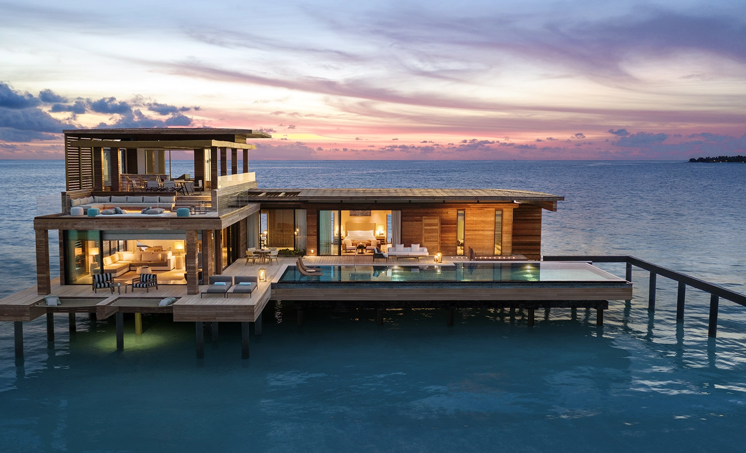 Perfect Hideaways, Waldorf Maldives, Luxury accommodation view of the house during sunset with the ocean in the background