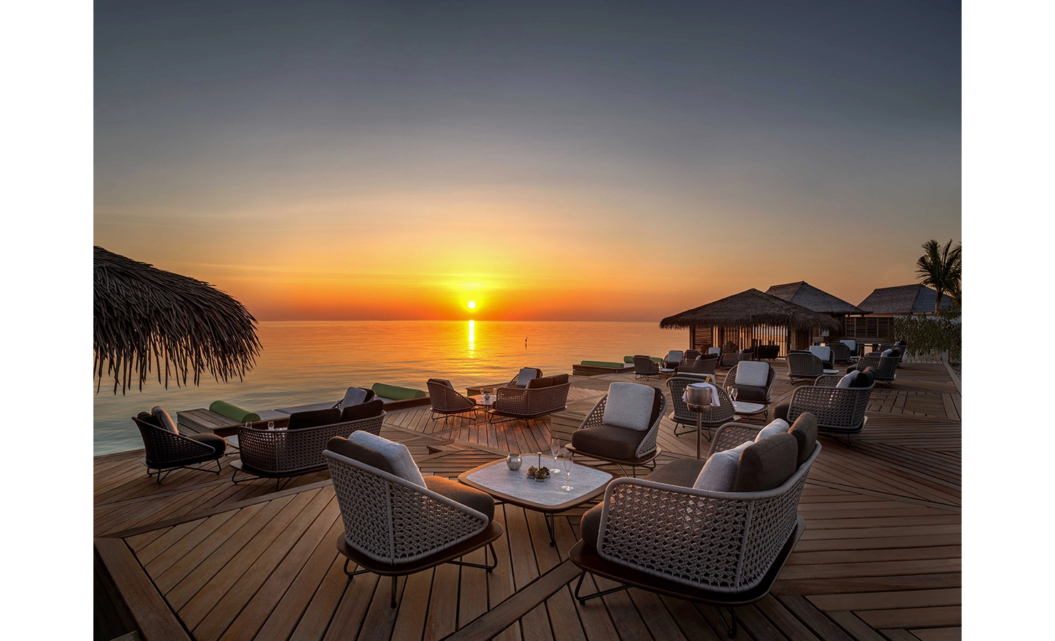 Perfect Hideaways, Waldorf Maldives, Luxury accommodation ocean view on the deck dueing sunset