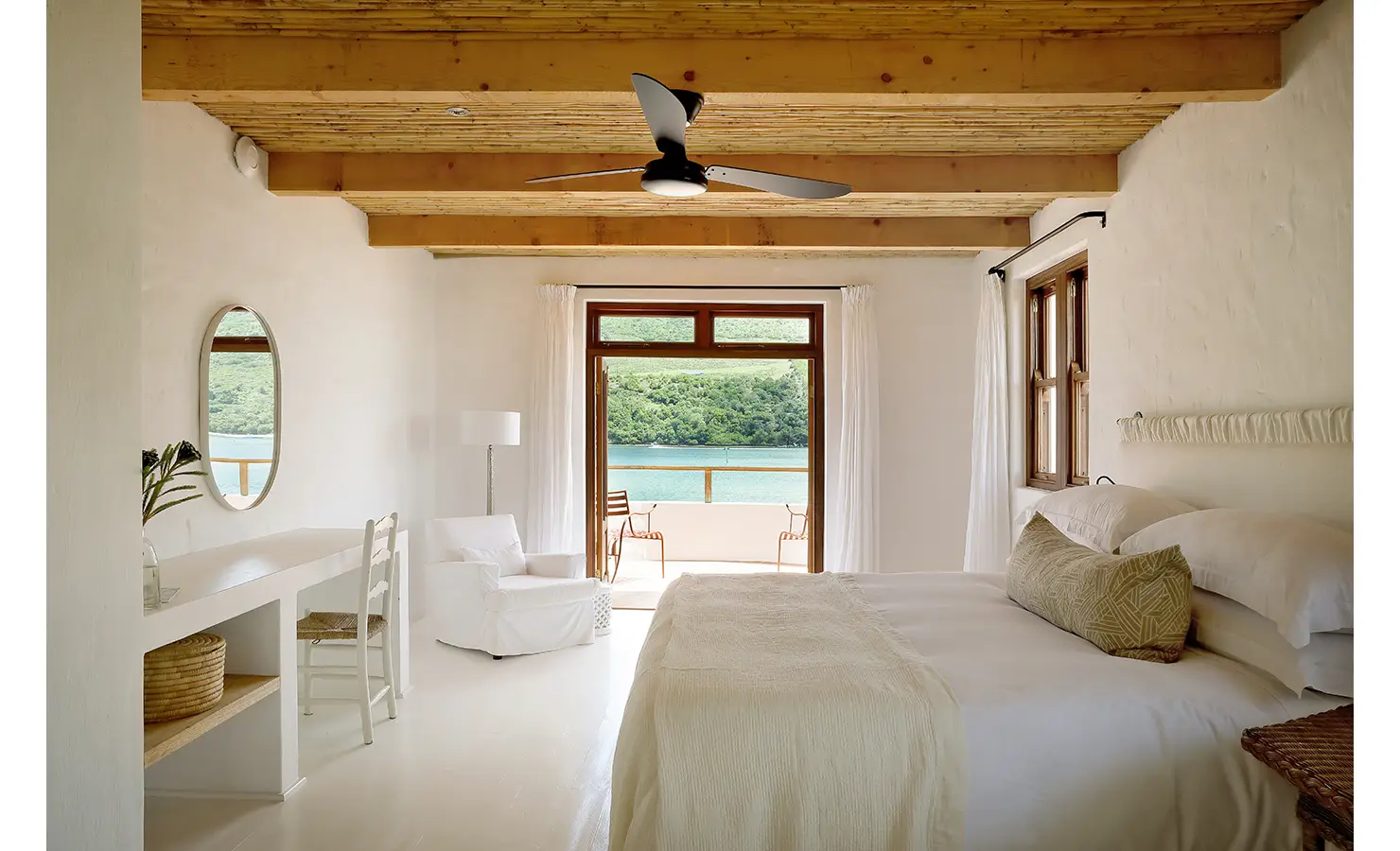 Perfect Hideaways: Serene main bedroom with ceiling fan, dressing table and doors to a balcony above the lagoon, Knysna, Tides Reach