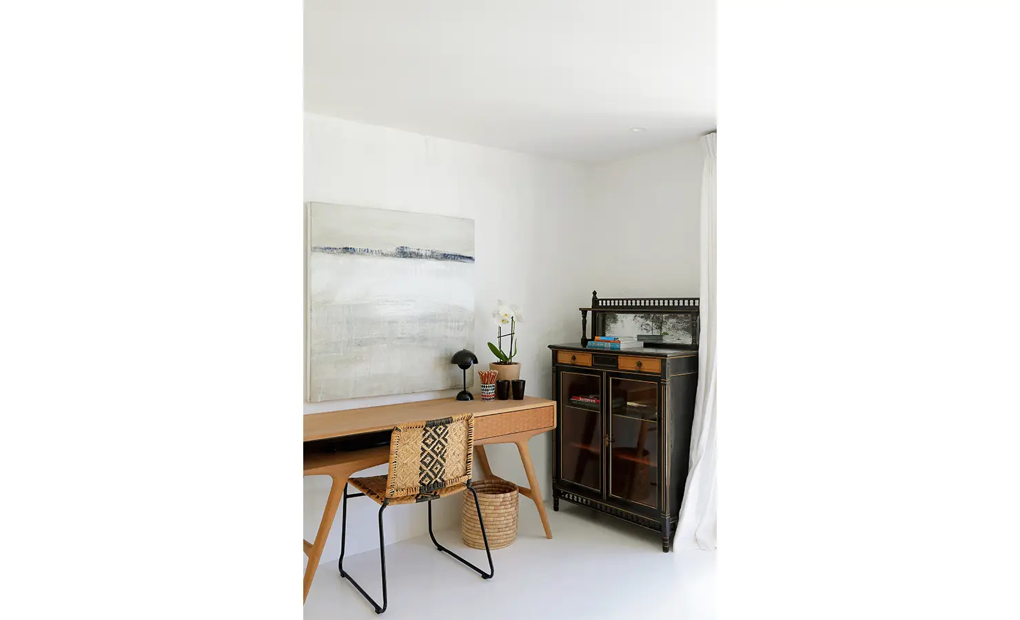 Perfect Hideaways: Quiet work nook with sculptural timber desk, woven chair and vintage cabinet beside sheer curtains, Knysna, Tides Reach