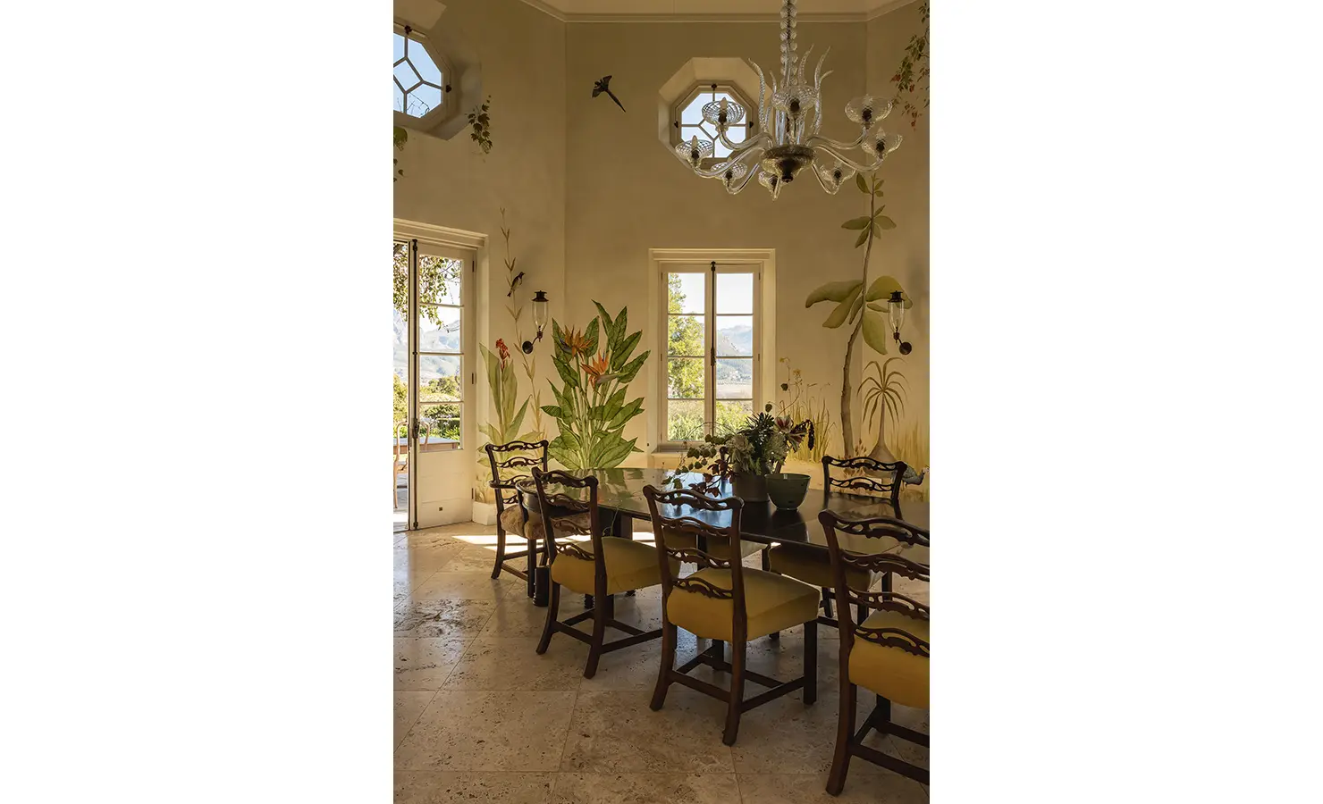 Perfect Hideaways elegant dining room with hand-painted botanical murals, vintage chandelier, and scenic garden views, Franschhoek, Varuna