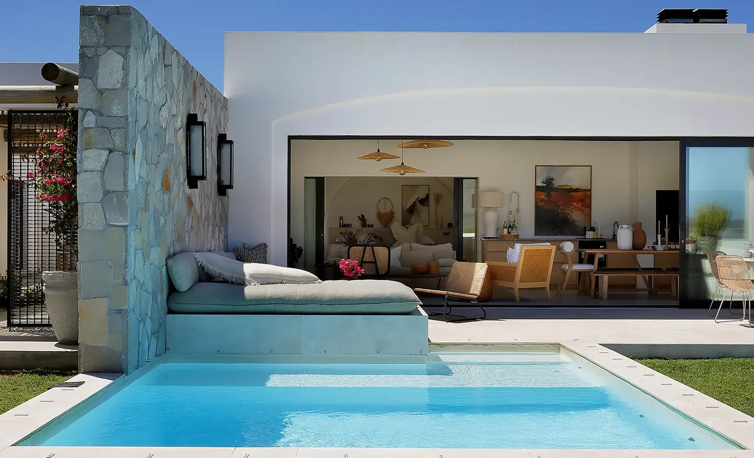 Perfect Hideaways modern patio and plunge pool with stone feature wall, open-plan living and dining area flowing seamlessly outdoors, Soudt, Kleinmond