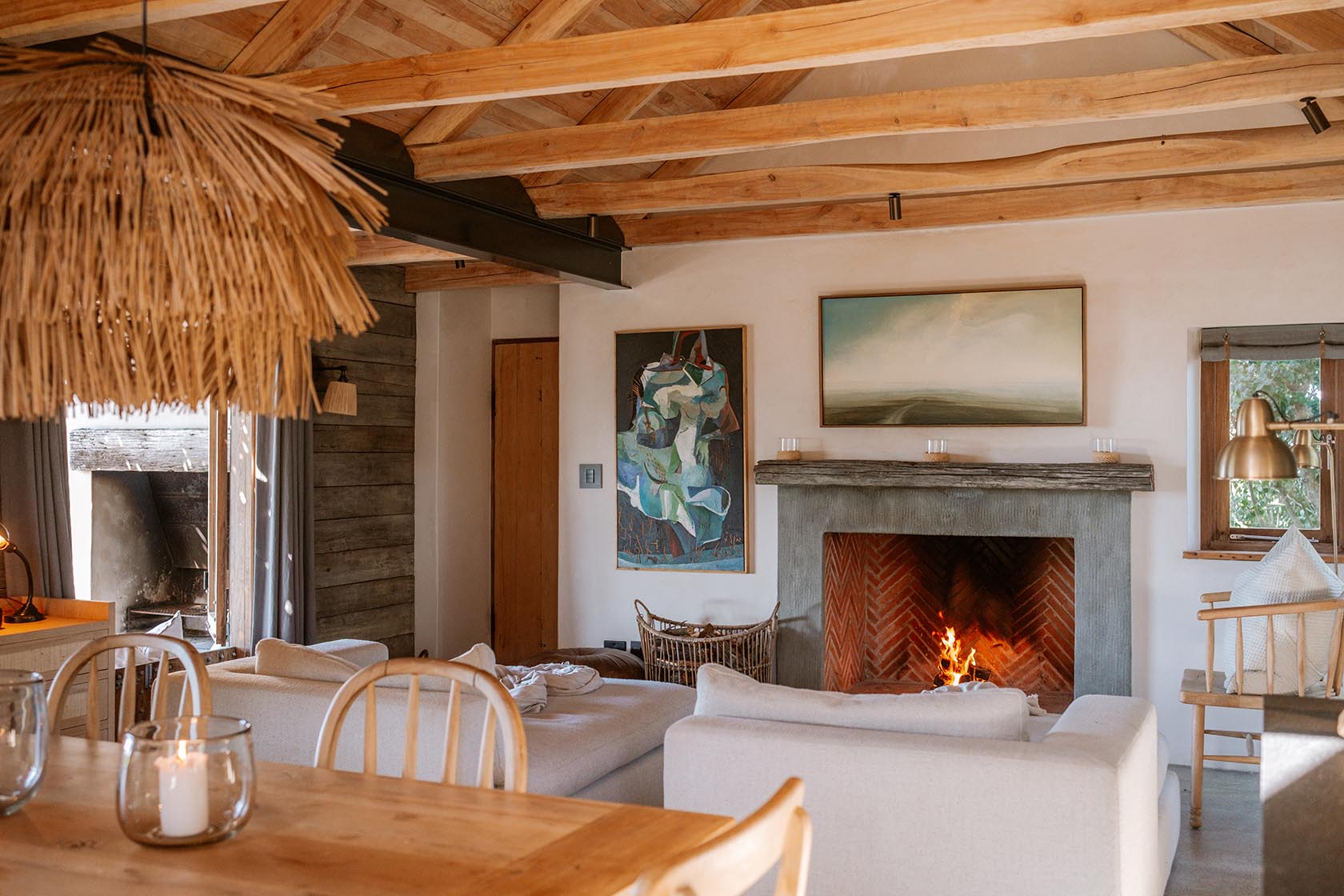 Perfect Hideaways- Open-plan living and dining space with exposed wooden rafters, a fireplace with stacked firewood, abstract artwork, soft seating and natural light filtering in from surrounding greenery, Yellowwood Cottage, Churchhaven, Western Cape, South Africa