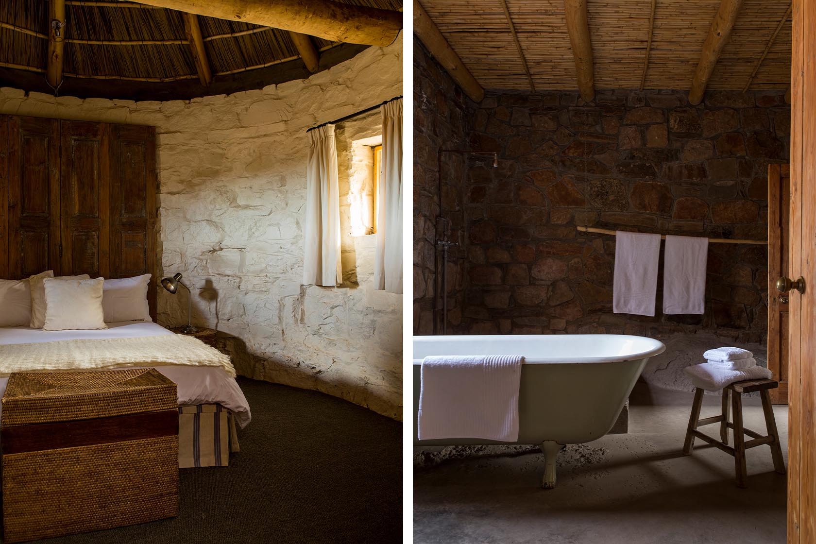 Perfect Hideaways- A round, rustic bedroom with thick whitewashed stone walls, a thatched ceiling supported by timber beams, a wooden headboard, and a simple bed dressed in soft neutrals; paired with an adjoining bathroom featuring a deep clawfoot tub set against warm stone walls and a bamboo ceiling. Karoo Cottage, Sneeuberg Nature Reserve, Eastern Cape, South Africa