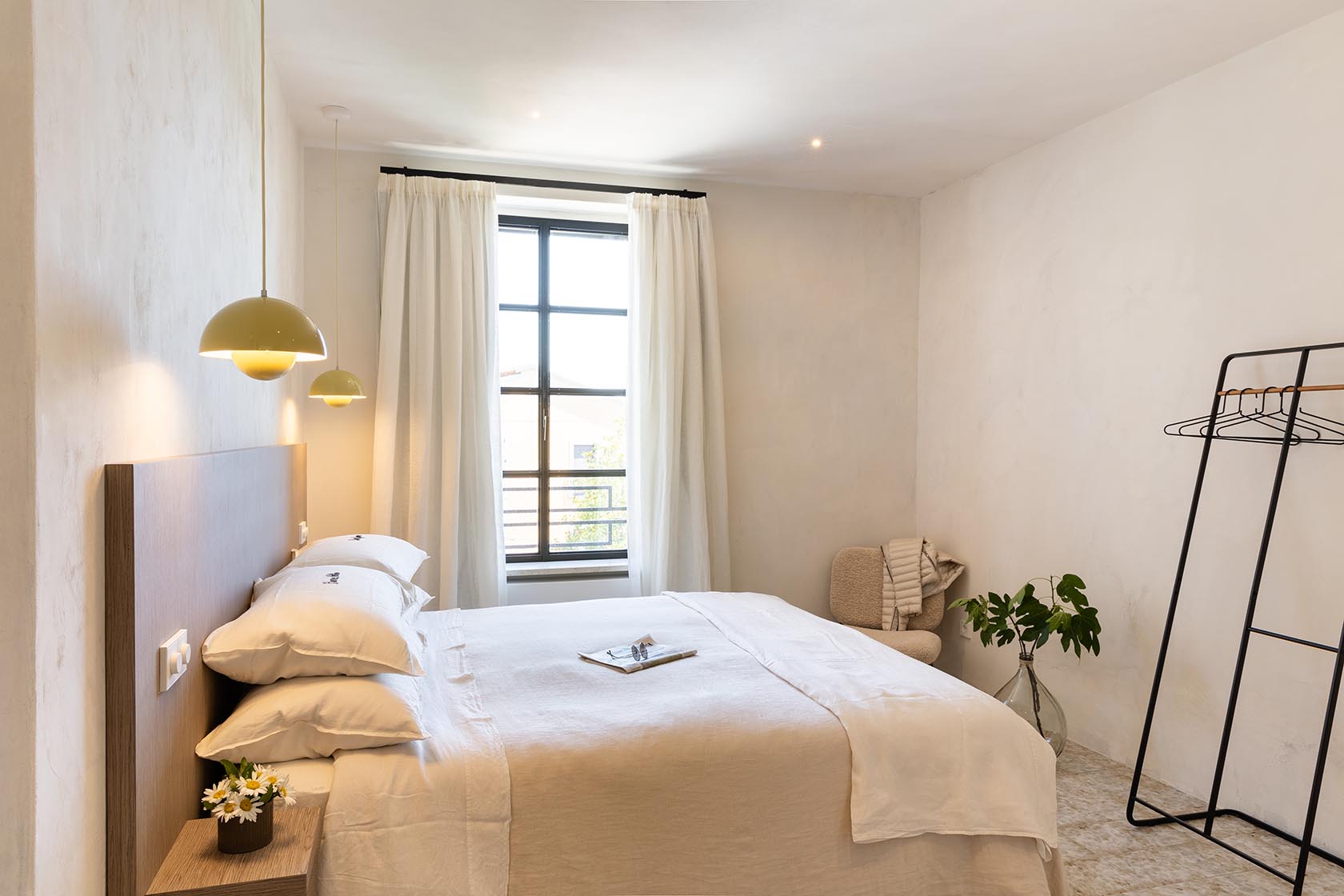 Perfect Hideaways serene double bedroom with minimalist décor and large window, Umbria Cottage, Collazzone