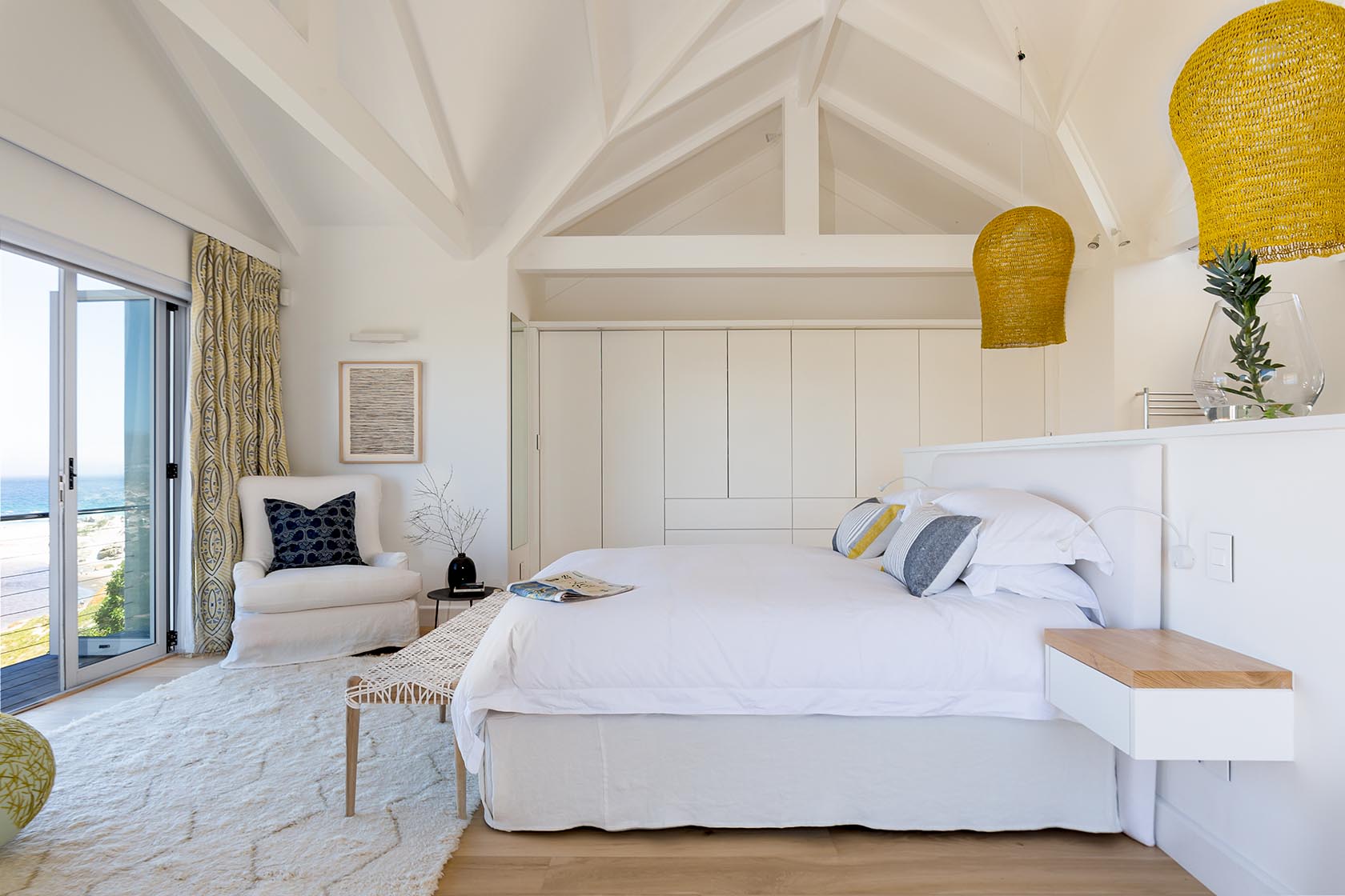 Perfect Hideaways - Serene main bedroom with vaulted ceiling, crisp white linens, woven pendant lights and sliding doors opening to ocean views Noordhoek Seashore_Noordhoek_Southern Peninsula_Cape Town_Western Cape_South Africa