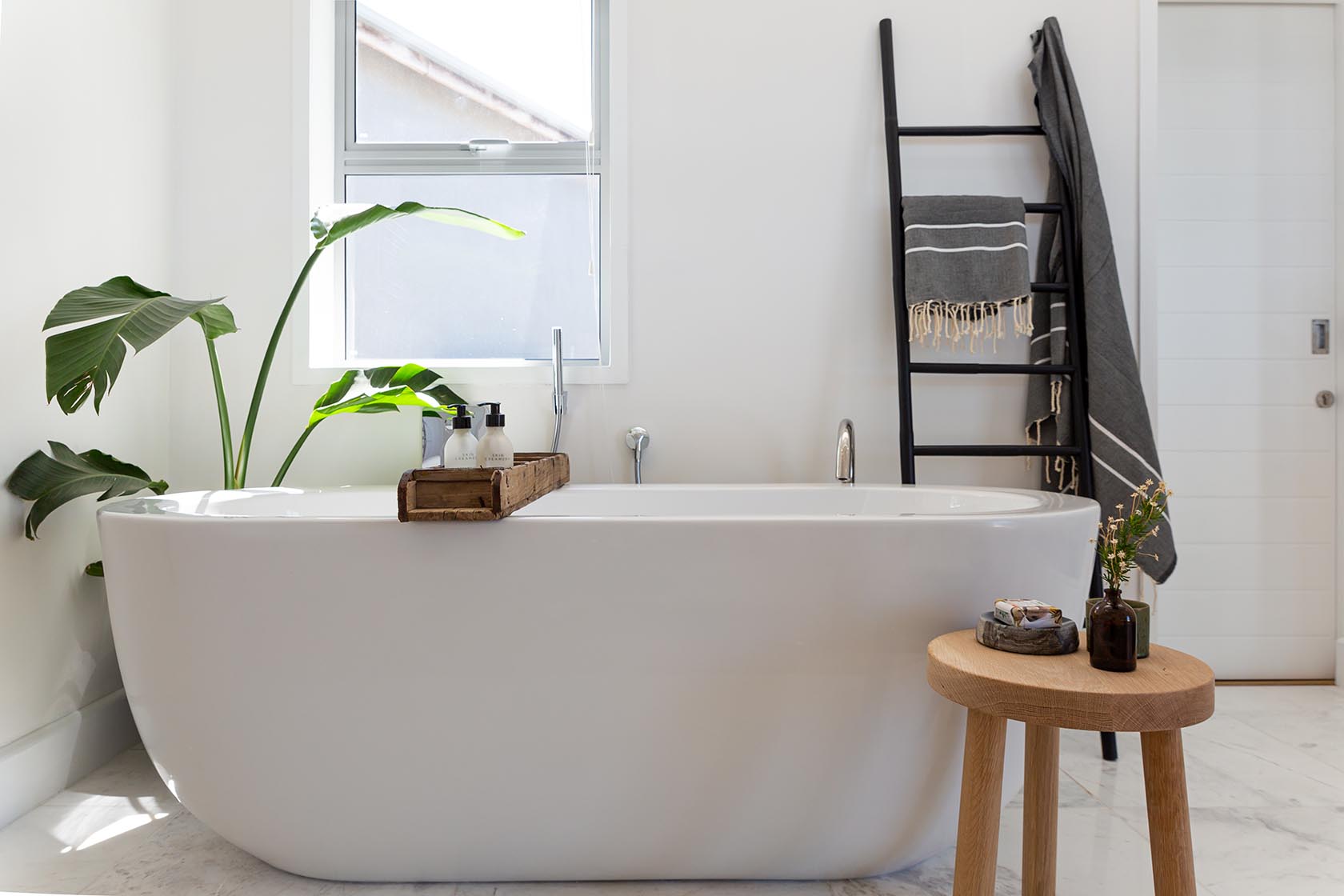 Perfect Hideaways - Contemporary bathroom with freestanding soaking tub, indoor plants, wooden stool and spa-style finishes Noordhoek Seashore_Noordhoek_Southern Peninsula_Cape Town_Western Cape_South Africa