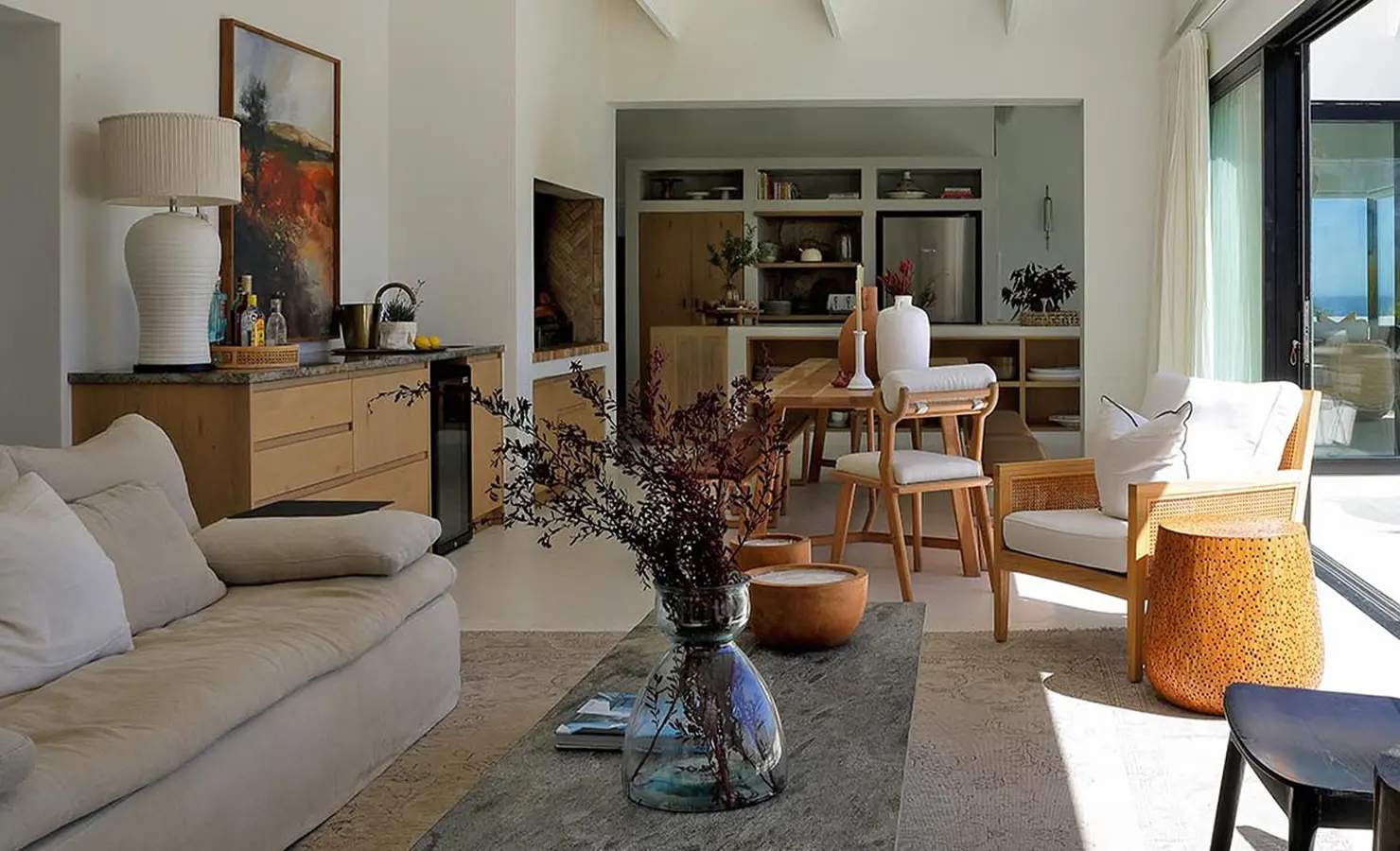 Perfect Hideaways stylish living and dining area with indoor braai, curated artwork and natural textures opening onto the patio, Soudt, Kleinmond