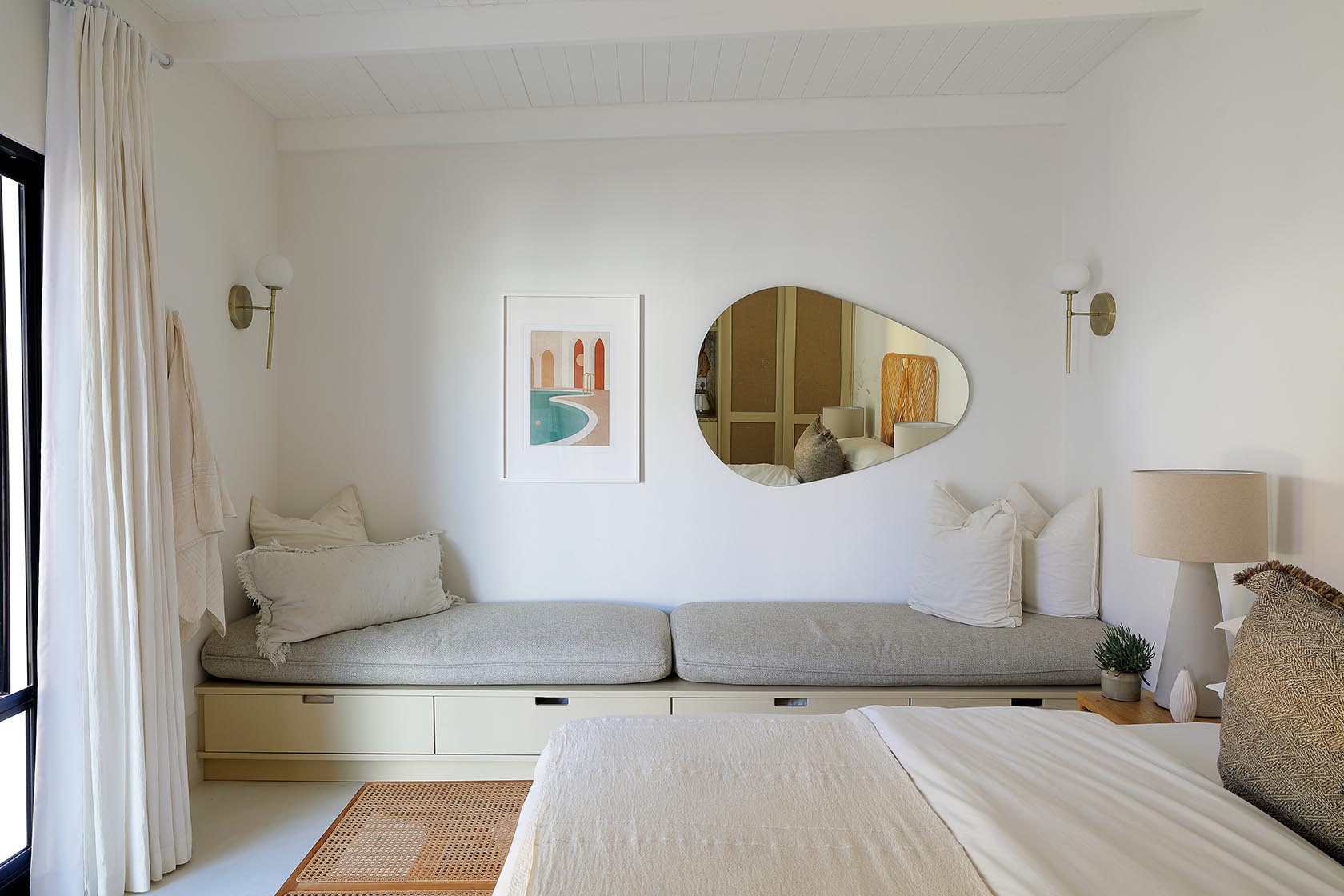 Perfect Hideaways calming bedroom with built-in window seat, soft neutral cushions, and minimalist coastal décor, Soudt, Kleinmond