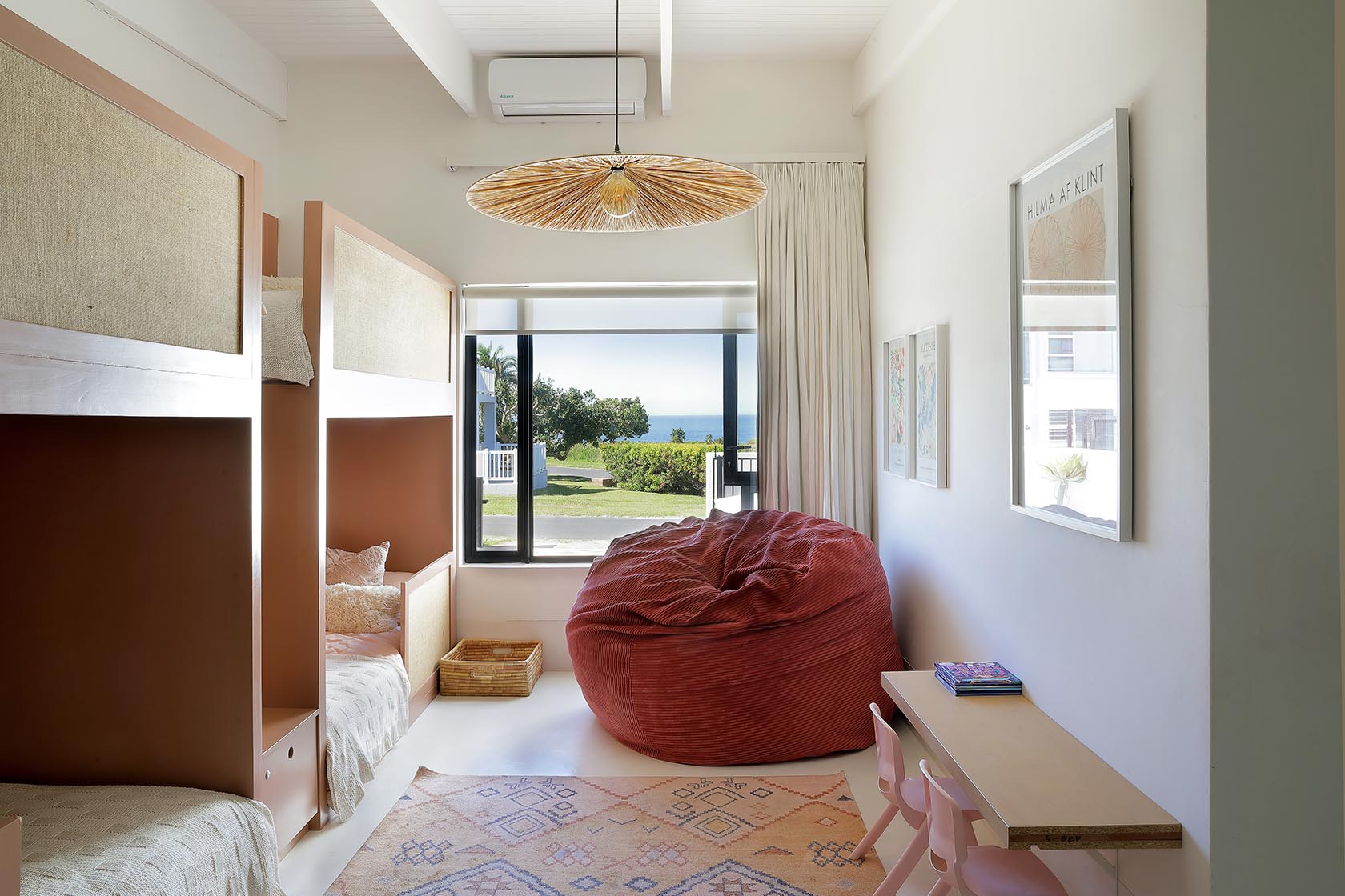 Perfect Hideaways bright kids’ bedroom with bunk beds, oversized beanbag, study desk, and ocean views through large windows, Soudt, Kleinmond