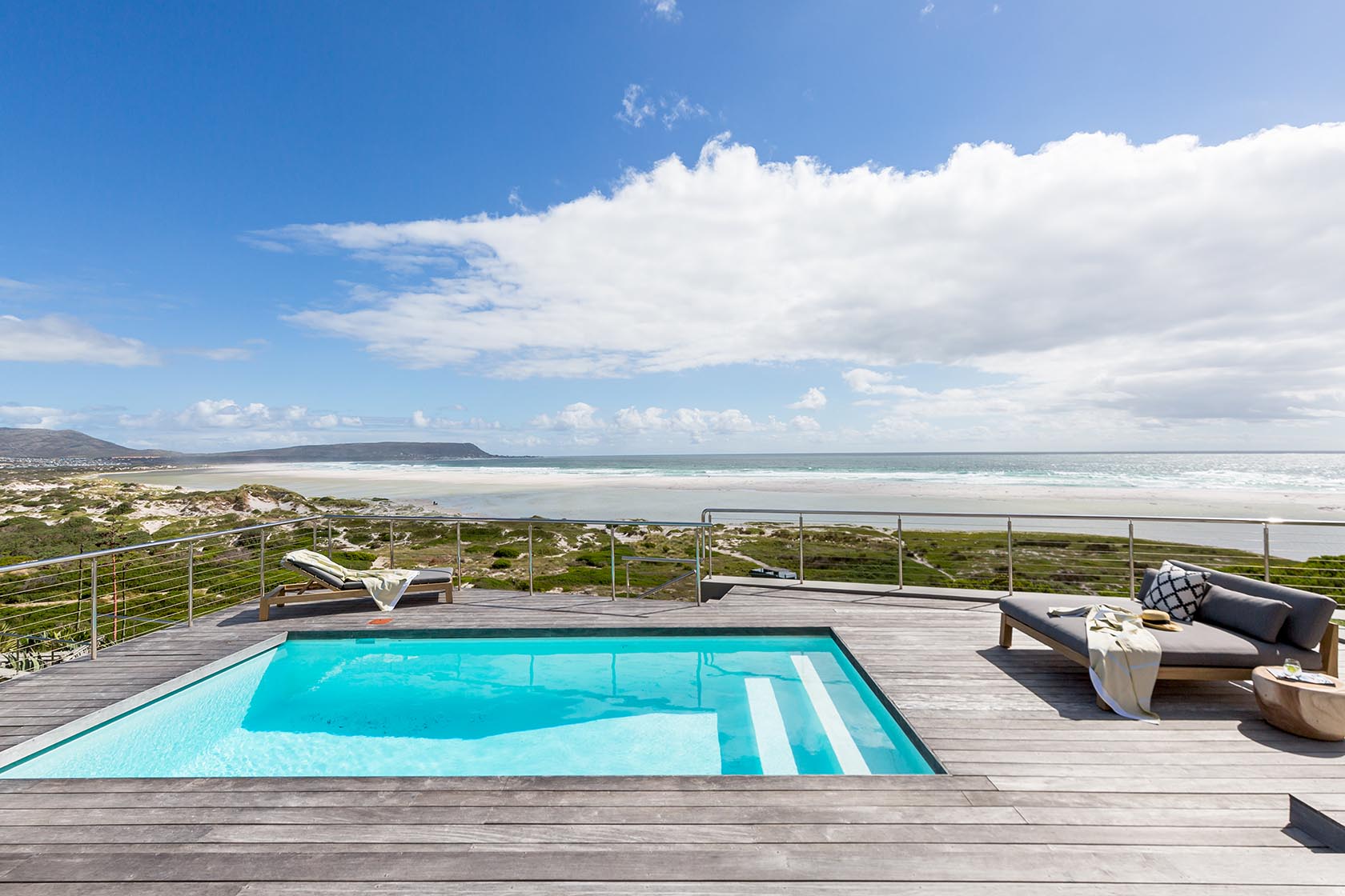 Perfect Hideaways - Infinity-style pool overlooking Noordhoek beach and the Atlantic Ocean, with sun loungers and uninterrupted coastal views Noordhoek Seashore_Noordhoek_Southern Peninsula_Cape Town_Western Cape_South Africa